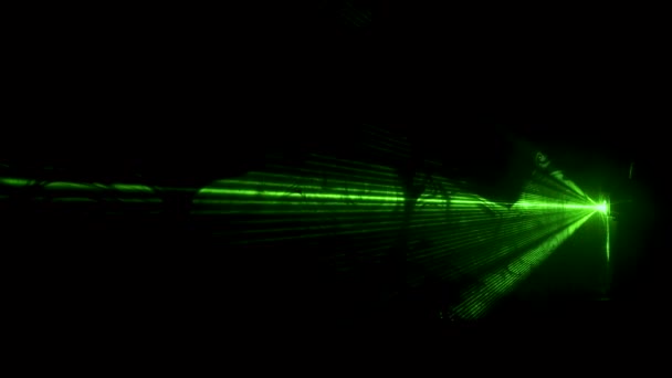 Dust particles in green laser light beam from diffraction grating