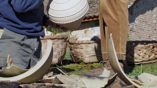 Close Man Hands Carrying Pottery Jars Open Stone Kiln — Stock Video