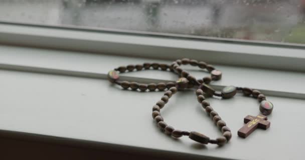 Wide Pan Right Wooden Rosary Beads — Stock Video