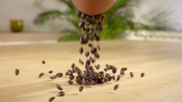 Roasted Coffee Beans Poured Scattering Wooden Table Close — Stock Video