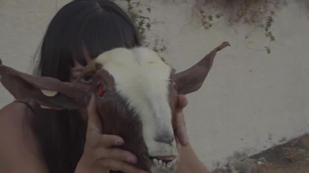 Young Woman Holding Goat Head Prop Red Eyes Interpretive Dance — Stock Video