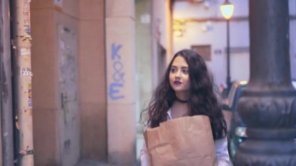 Beautiful Spanish Woman Paper Bag Arrives Condo Unit Press Video — Stock Video