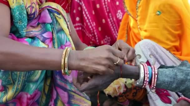 Indian Woman Rural Village Ties Pooja Puja Bracelet Friend Wrist — Stock Video