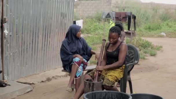 Woman Pounding Grinding Tiger Nut Flour Motor Pestle — Stock Video