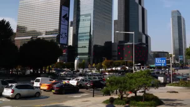 永同大路の交通渋滞と三成駅周辺の人々 Coex World Trade Centerソウル Wtc 韓国昼間のパンニング時間の経過 — ストック動画
