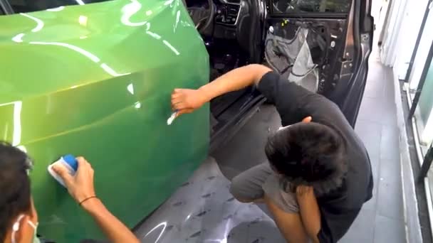 Installing Vinyl Film Vehicle Doors Professional Car Tuning Station — Stock Video