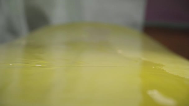 Clear Shine Epoxy Resin Covering Surfboard Paint Brush Indoor Workshop — Stock Video