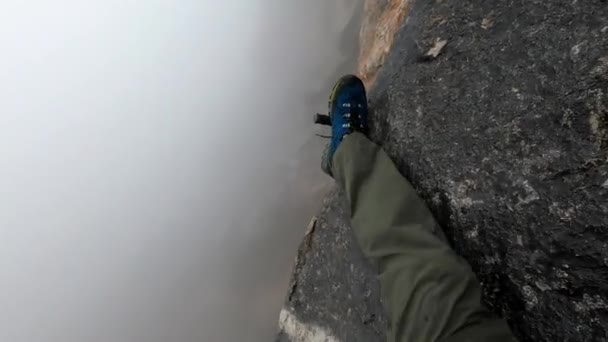 Man Standing Two Pieces Iron Put Rock Hundreds Meters Ground — Stock Video