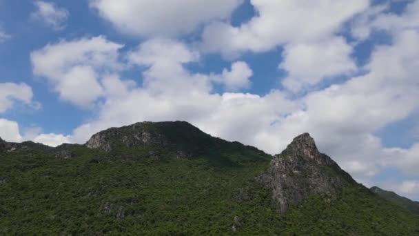 Aerial Footage Sliding Right Revealing Limestone Mountain Tower Jutting Out — Stock Video