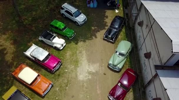 Colorful Collection Antique Vintage Classic Cars Overhead Ascending Drone Shot — Stock Video