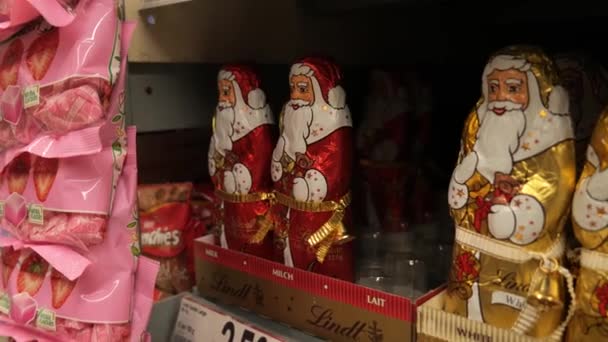 Festive Season Shiny Wrapped Chocolate Santa Claus Christmas Ornament Retail — Stock Video