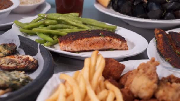 Tempting Variety Fried Blackened Seafood Restaurant Plates Close — Stock Video