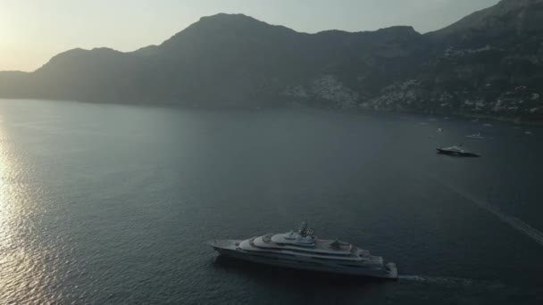 Drone Shot Mega Luxury Yacht Positano Italy Motoring Out Sunset — Vídeos de Stock