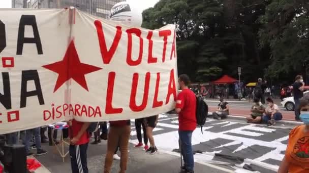 Протест Против Президента Бразилии Болсонаро Баннер Вольта Лула Проспекте Паулиста — стоковое видео