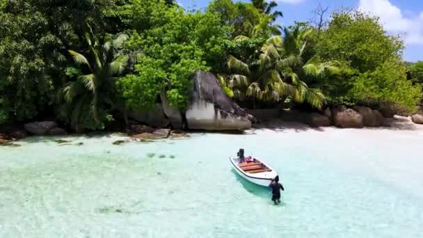 Seychelles Digue Row Boat Beach Rocks Aerial Drone1 Mp4 — Stock Video