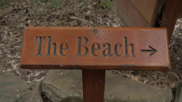 Beach Letters Arrow Sign Carved Wood Qld Australia Close — Stock Video