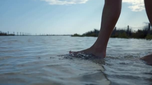 Male Feet Crossing Flooded Area Static Shot — Stock video