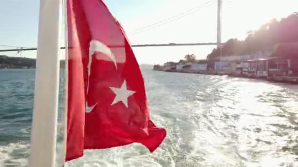 Turkish Flag Waving Sea Next Famous Bosporus Bridge Istanbul — Stock Video