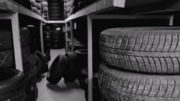 Car Tyres Stacked High Tyre Car Repairs Shop Stock Video — Stock Video