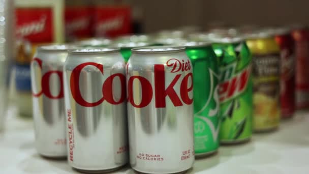 Variety Drink Brands Flavors Soda Pop Cans Table — стокове відео