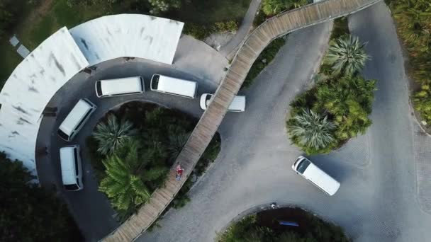 Top View White Shuttle Vans Entrance Resort Aerial — Stock Video