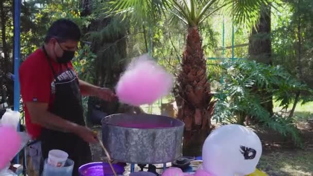 Person Prepares Cotton Candy — Stock Video