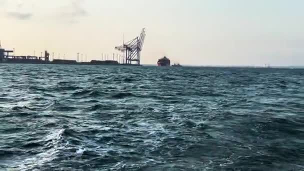 Wavy Water Black Sea Overlooking Harbor Cranes Sailing Boat Odesa — Stock Video