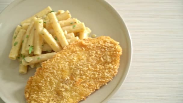 homemade quadrotto penne pasta white cream sauce with fried fish