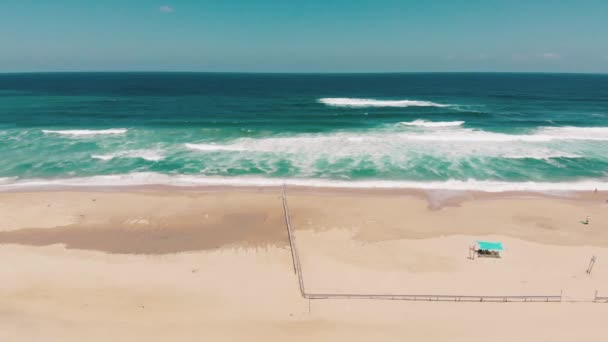 Aerial Drone Showing Endless Wild Sea Breaking Sandy Coastline — Stock Video