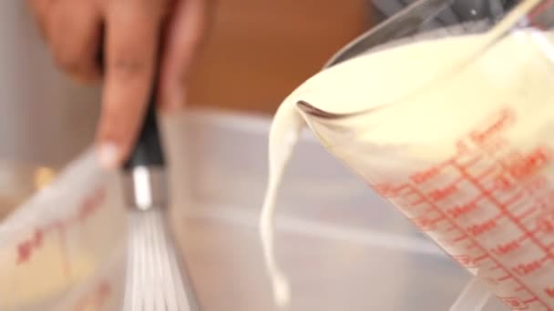 Pour Milk Dry Ingredients Make Waffle Batter Mixing Whisk Isolated — Stock Video