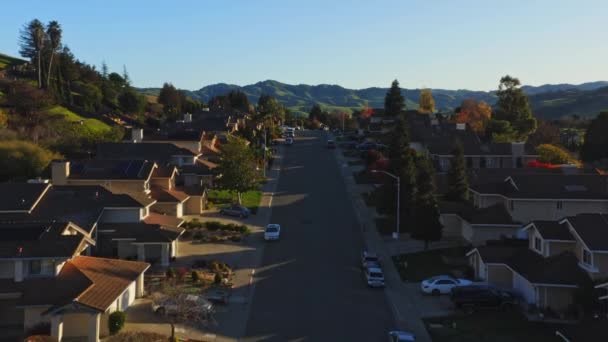 Aerial Beautiful Suburban Neighborhood Two Suvs Pull Out Driveway One — Stock Video