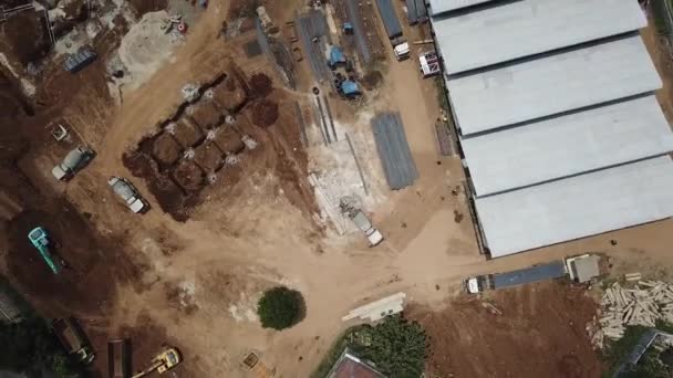 Aerial Work Progress Construction Site Trucks Overhead Drone Shot — Stock Video