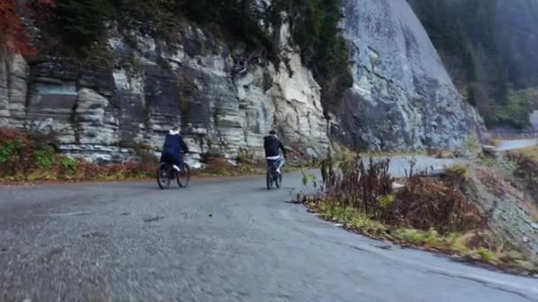 Low Aerial View Two Cyclists Cycling Road Forest Family Sports — Stock Video