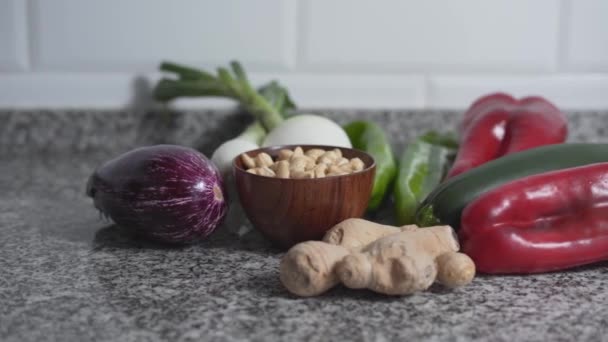 Colorful Vegetables Bowl Cashew Nuts Kitchen Countertop Pan Right — Stock Video