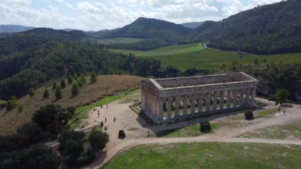 Pan Aerial Ancient Greek Temple Rolling Hills Puffy Clouds — Stock video