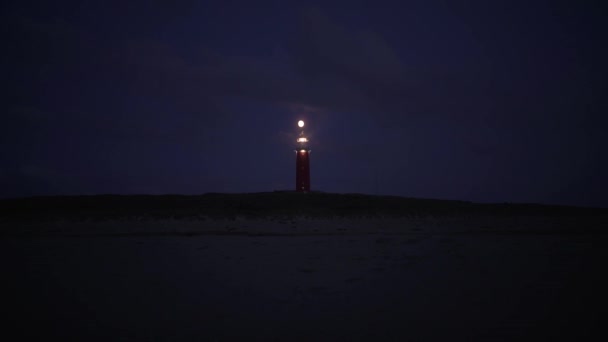 Vista Notturna Del Faro Con Proiettore Luce Rotante Texel Paesi — Video Stock