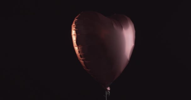 Pink Heart Shaped Balloon Floating Air Turning Slightly Very Dark — Stock Video