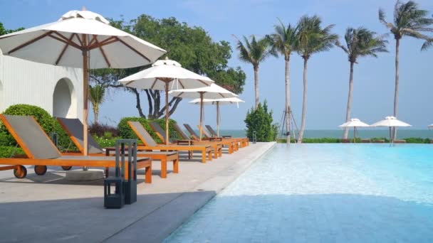 Umbrella Bed Pool Swimming Pool Ocean Sea Background Holiday Vacation — Vídeo de Stock