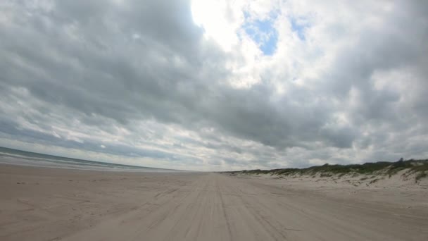 Pov Thru Windshield Vehicle Driving Deserted Beach Surf Dunes North — Stock Video