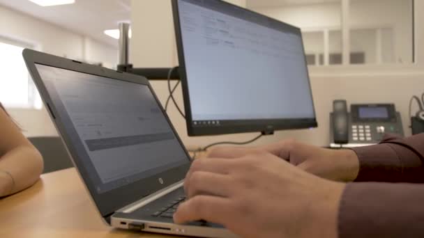 Woman Getting Financing Estimate Man His Office Desk Arms Visible — Stock Video