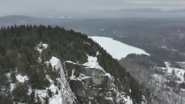 Aerial Shot Man Top Rocky Winter Mountains Quebec Canada — Stock video