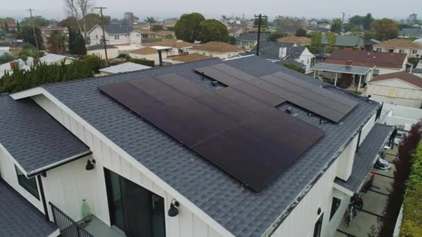 Aerial Orbit Rooftop Solar Panels Installed Cloudy Day Los Angeles — Stock Video