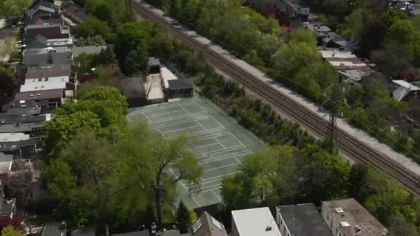 Five Tennis Courts Visible Air Neatly Built Railway Station Trees — ストック動画