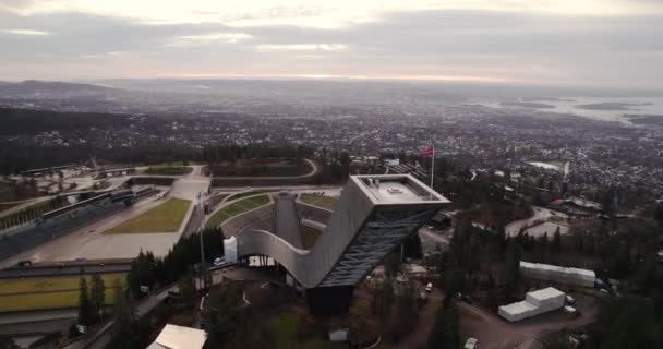 Flying Holmenkollbakken Ski Jumping Hill Amphitheater Oslo Norway Sunrise — стокове відео