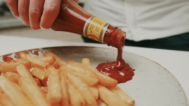 Chef Puts Deep Red Color Ketchup Plate Golden French Fries — ストック動画