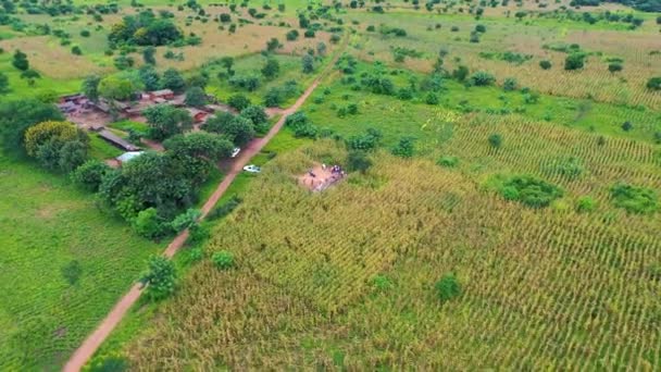 Drone Flying Backwards Remote Village Well Malawi Africa — Stock Video