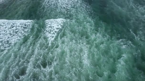 Aerial Dolly Turquoise Foamy Sea Waves Hitting Sand Beach Green — Stock Video