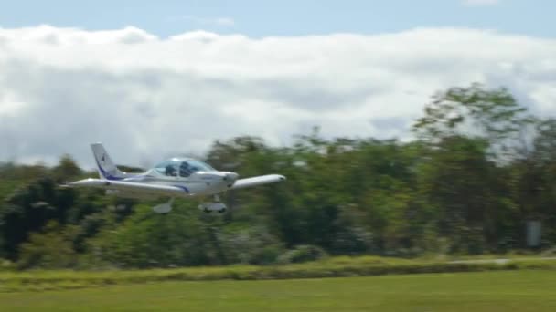 Small White Hobbyist Aircraft Landing Airstrip — Stock Video