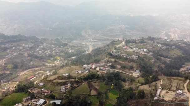 Aerial View Village Scattered Ridge Hill Terraced Fields Surrounding Nepal — Stock Video