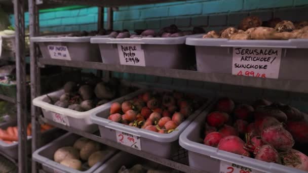 Organic Root Vegetables Grocery Market Sitting Industrial Metal Shelf Hand — Stock Video